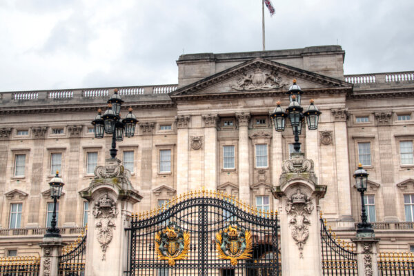 An image of the front elevation of Buckingham Palace and the ornate gates as illustration for post 'Highlights from the King’s Speech 2024'