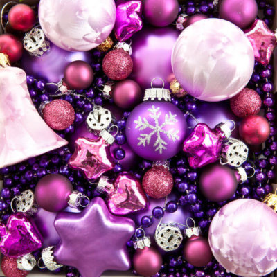 Purple and pink christmas ornaments as image for Blog Post Christmas is Coming