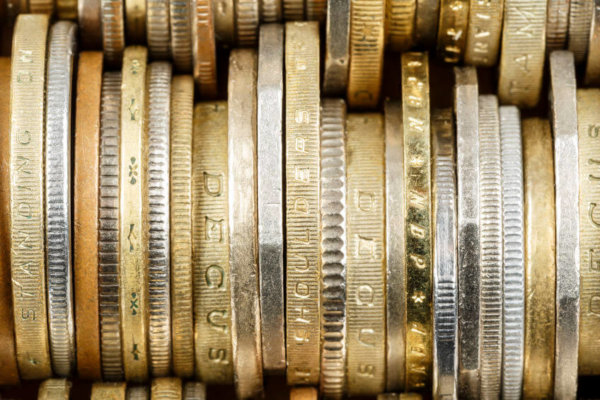 Image of coins in close-up for Blog post 'How will Barclays tightening lending criteria affect Businesses?'