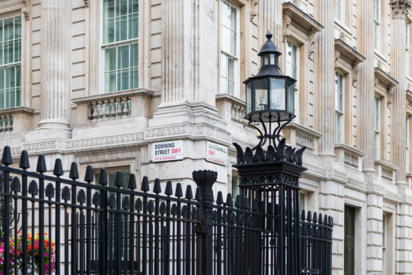 An image of the railings outside Downing Street with road names for Downing Street and Whitechapel as illustration for post 'What are Rachel Reeves' main priorities as Chancellor of the Exchequer?'