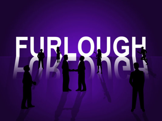 Images of the word 'furlough' on a purple background with silhouettes of people around as illustration for blog post 'Furlough Scheme Statistics - February 2021'