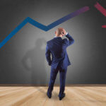 Image of man in front of a declining graph for Blog post 'Is your business 'Growing Broke'?'