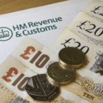 HMRC letter and cash as illustration for blog post 'HMRC Tax income is down £30billion'