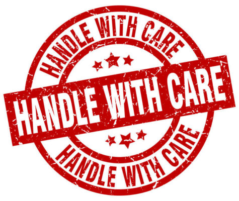Red stamp saying 'Handle with Care' as illustration for Blog Post 'Get on the front foot with employee retention'.