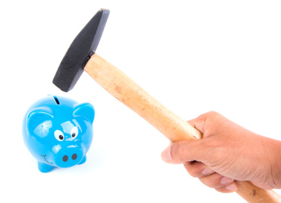 An image of a hammer about to strike a blue piggy bank as illustration for post 'Insolvency Guidance updated'