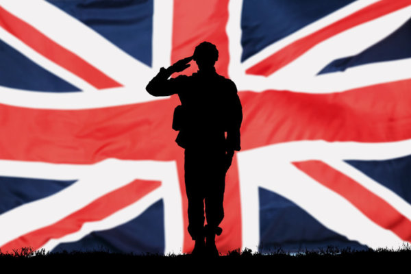 Image of Soldier silhouette with UK flag behind as illustration for blog post 'New tax cuts for employers of Veterans'