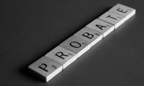 Image of Scrabble pieces spelling out the word 'probate' as image for blog post 'Brexit delays for Probate Fee increases'