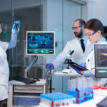 Image of scientists in a lab as illustration for blog post 'What do you need to prove for an R&D Claim?'