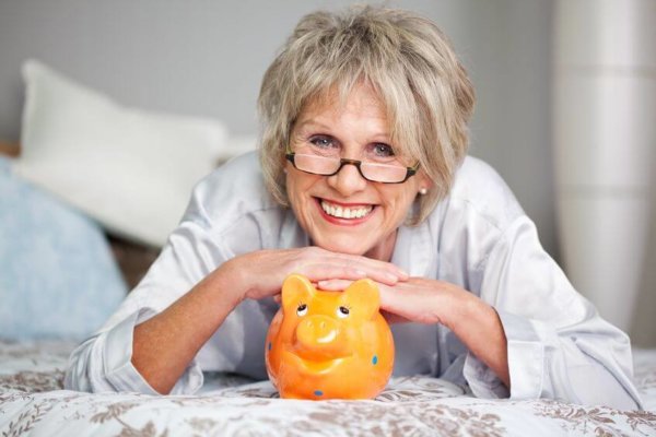 Image of a happy retired lady as illustration for blog post 'Private Pension withdrawal age to be raised.'