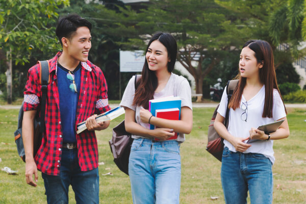 An image of three students as illustration for post 'Updated interest rates and repayment thresholds for student loans announced.'