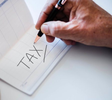 Image of notebook with 'Tax' written in it, as image for Blog Post 'What is a Personal Tax Account?'