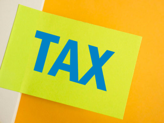 Image of a 'Tax' label as illustration for blog post 'Making Tax Digital for Corporation Tax?'