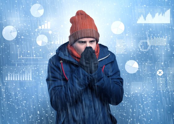 Image of cold worker wrapped up in outdoor clothing as illustration for post 'Is it too cold to work?'.