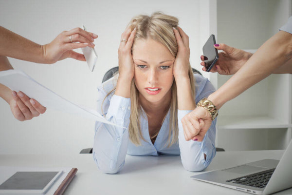 Image of Overwhelmed Businesswoman for blog post 'What do I do first?'