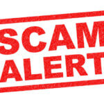 Image of 'Scam alert' stamped in red as illustration for blog post 'HMRC branded scams surge...'