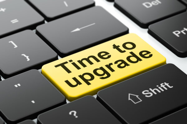 Image of a keyboard with a 'Time to upgrade' button as illustration for post 'Changes to Xero New Invoicing'